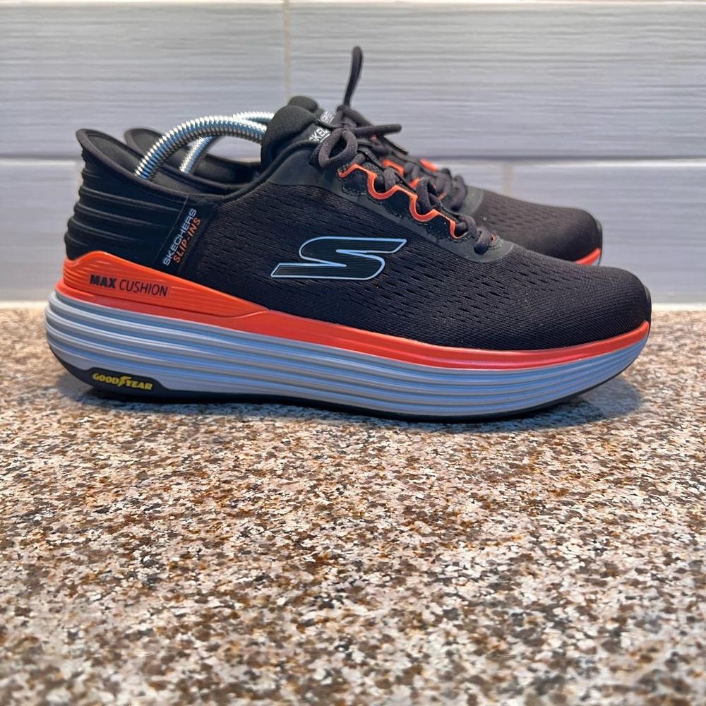Skechers Men’s Black with Orange Accent Max Cushion Sneakers
